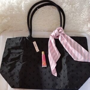 Elegant Black Tote Bag with Pink Scarf Accent